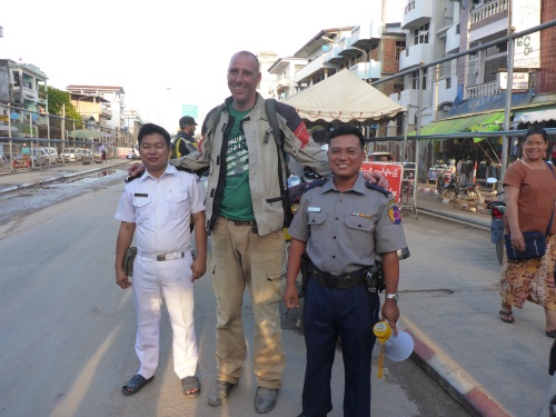 Ha ha, you me the world look normal until I see photos and people look tiny! (Said Dave on seeing this photo of him taken with Myanmar border officials)